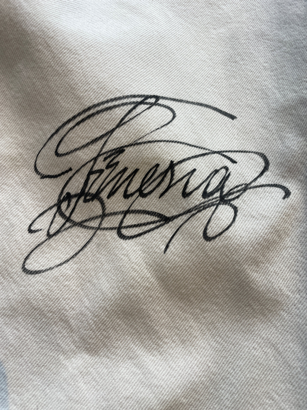 White calligraphy anime flare jeans