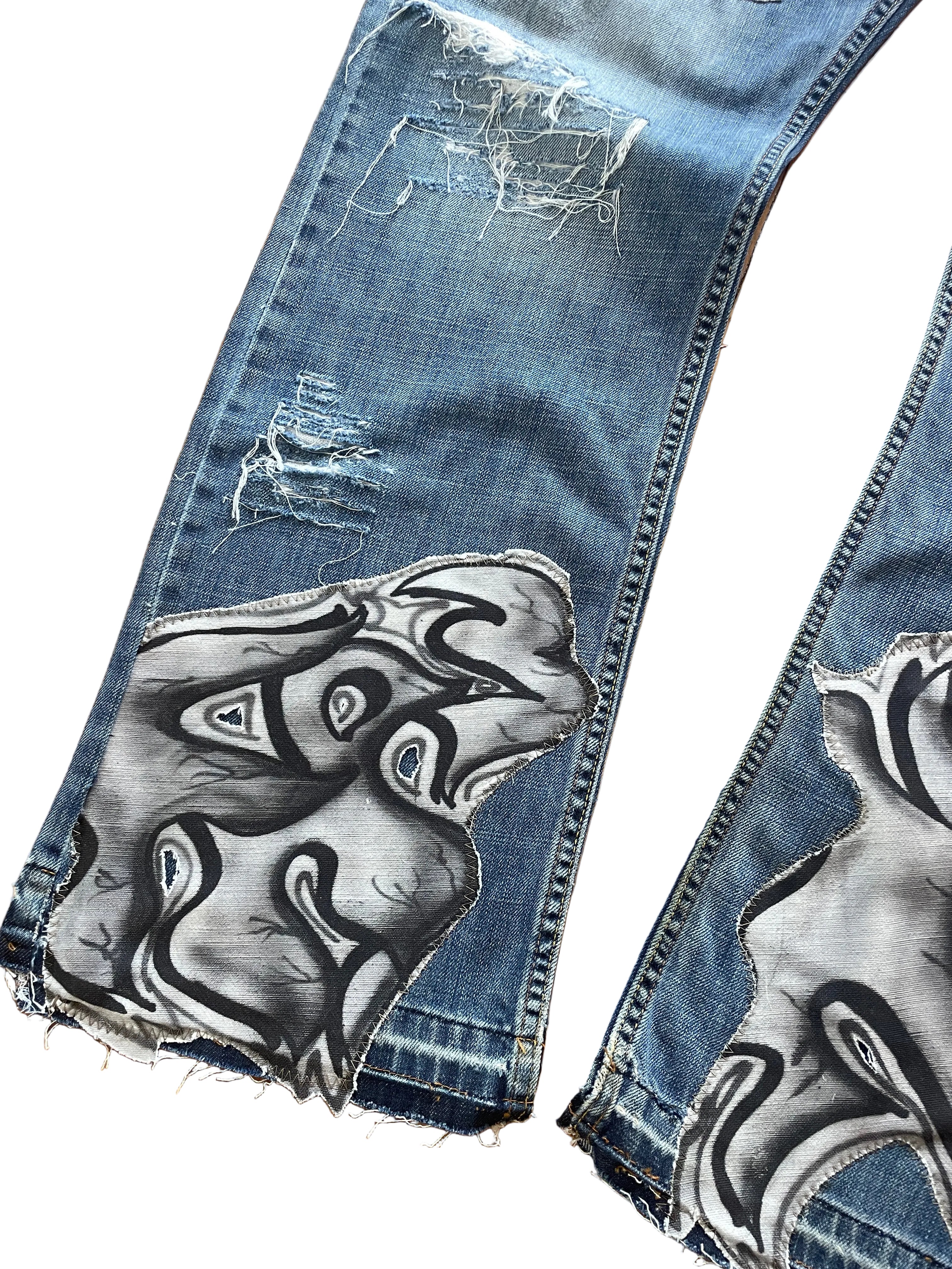 Patched graffiti distressed wide jeans