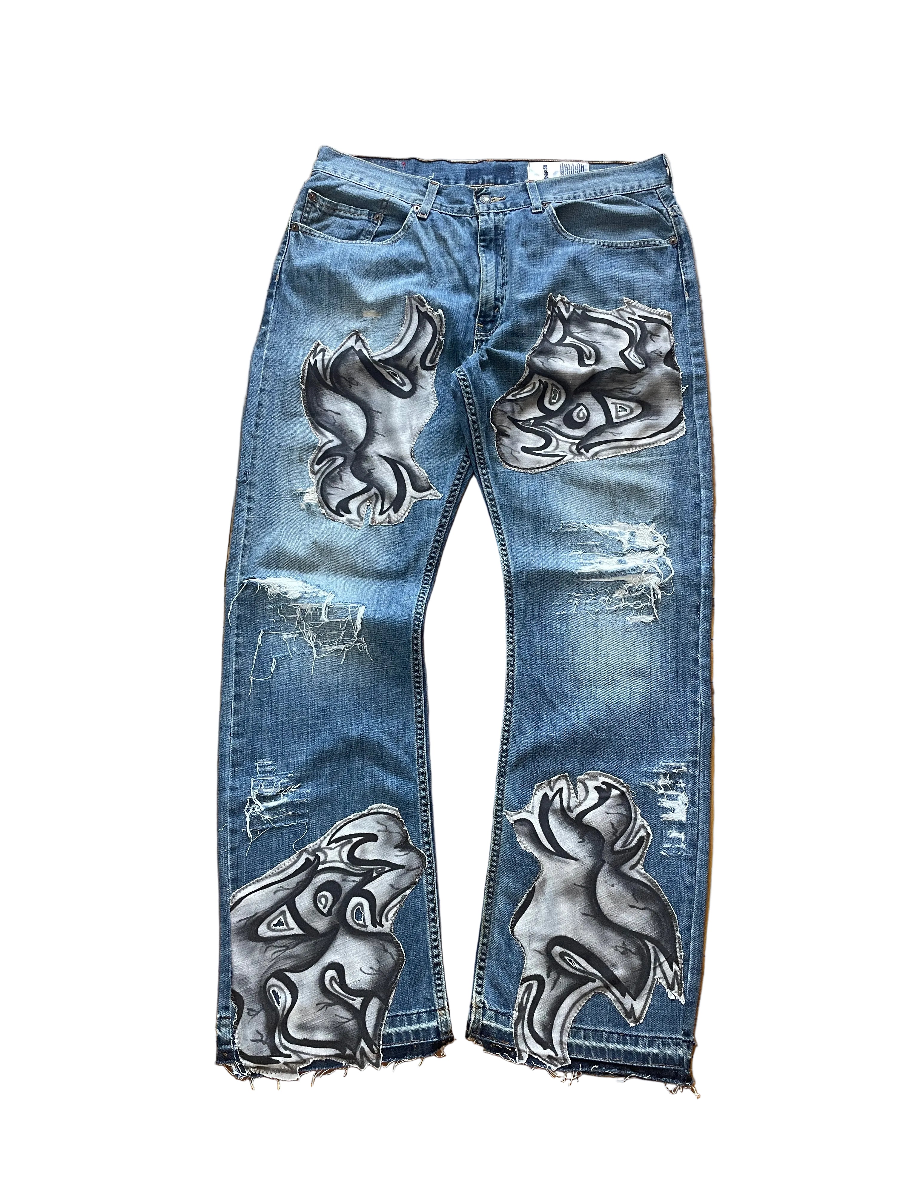 Patched graffiti distressed wide jeans