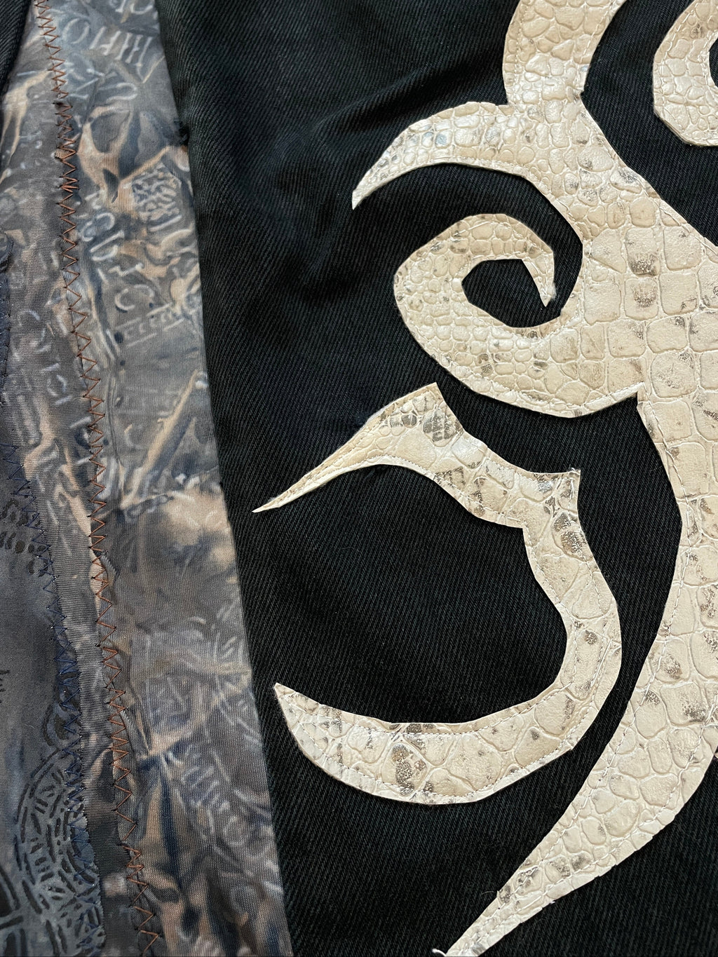 Python graffiti flare jeans