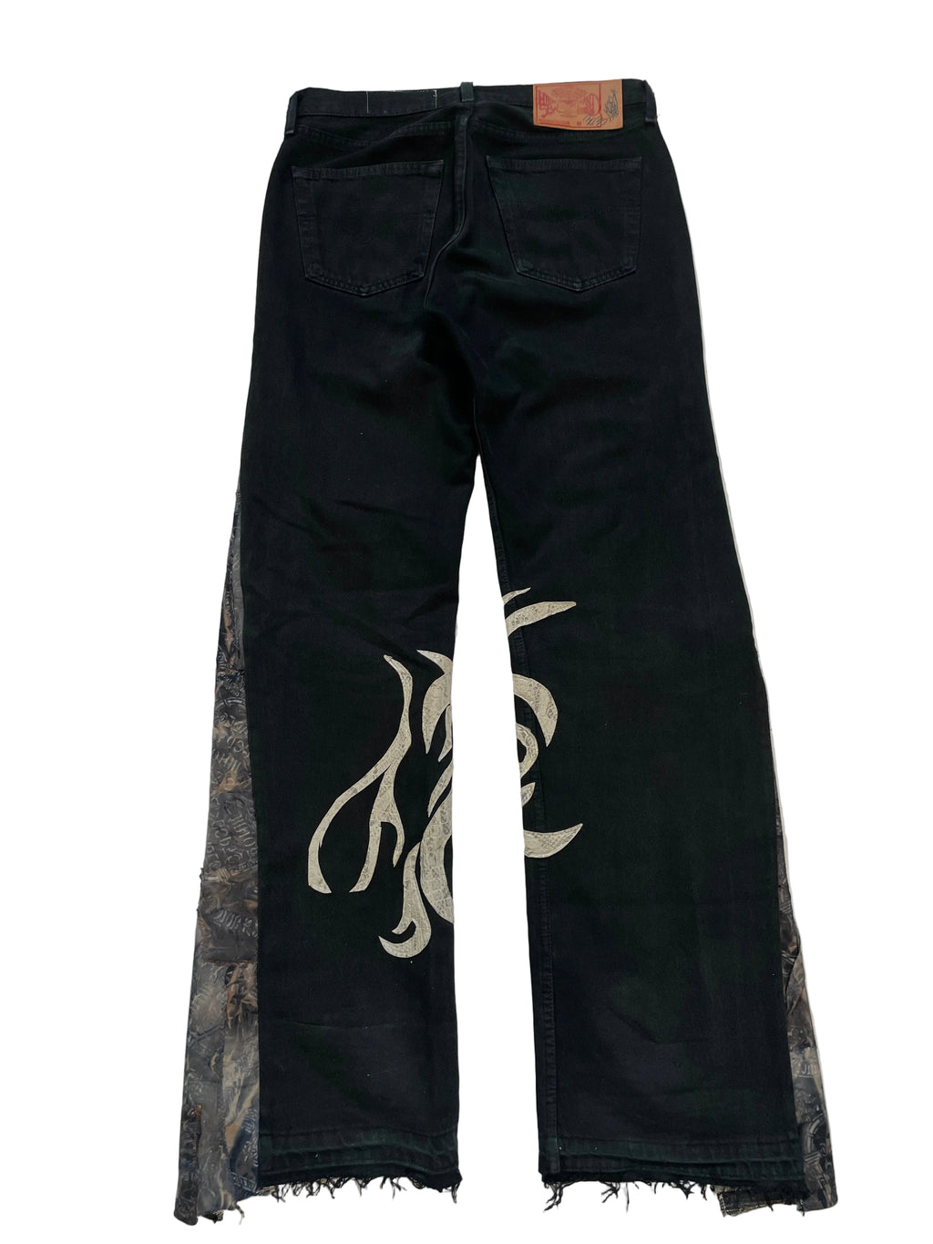 Python graffiti flare jeans