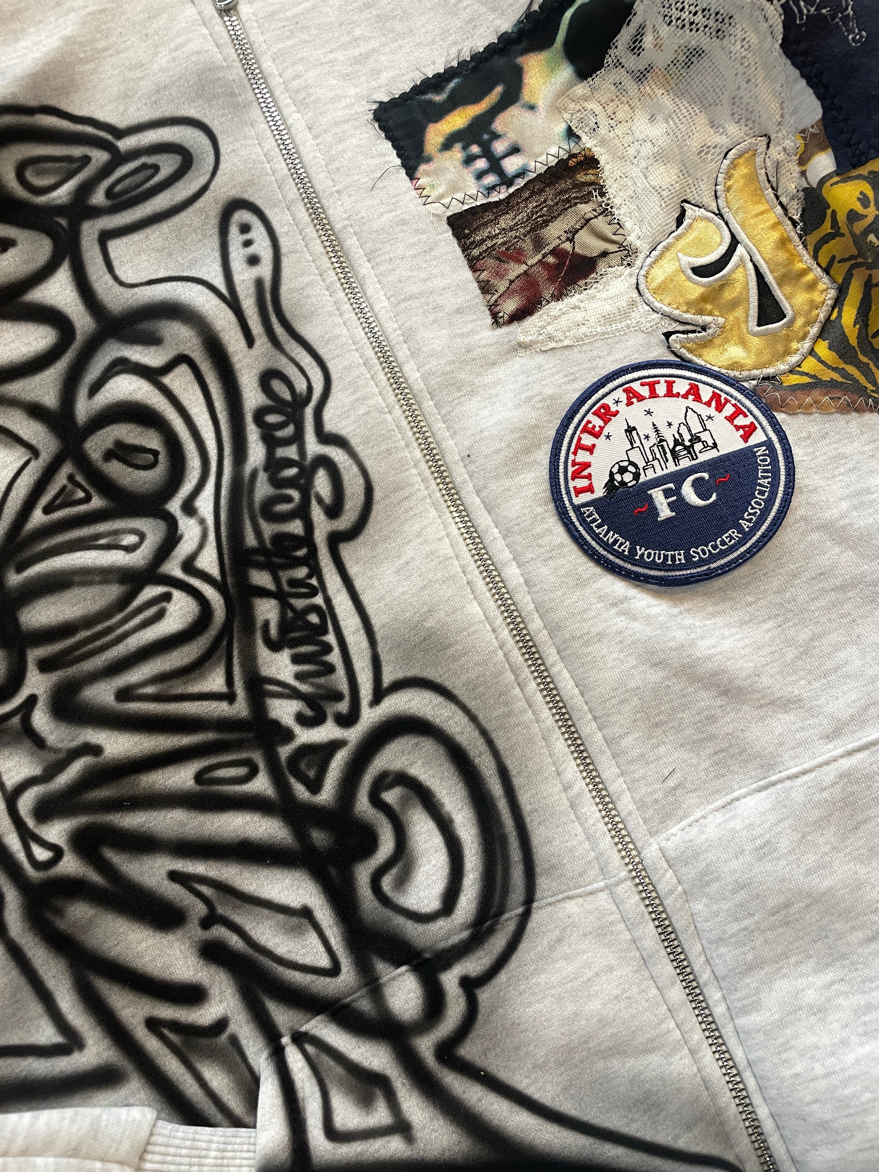 Calligraphy patchwork zip hoodie