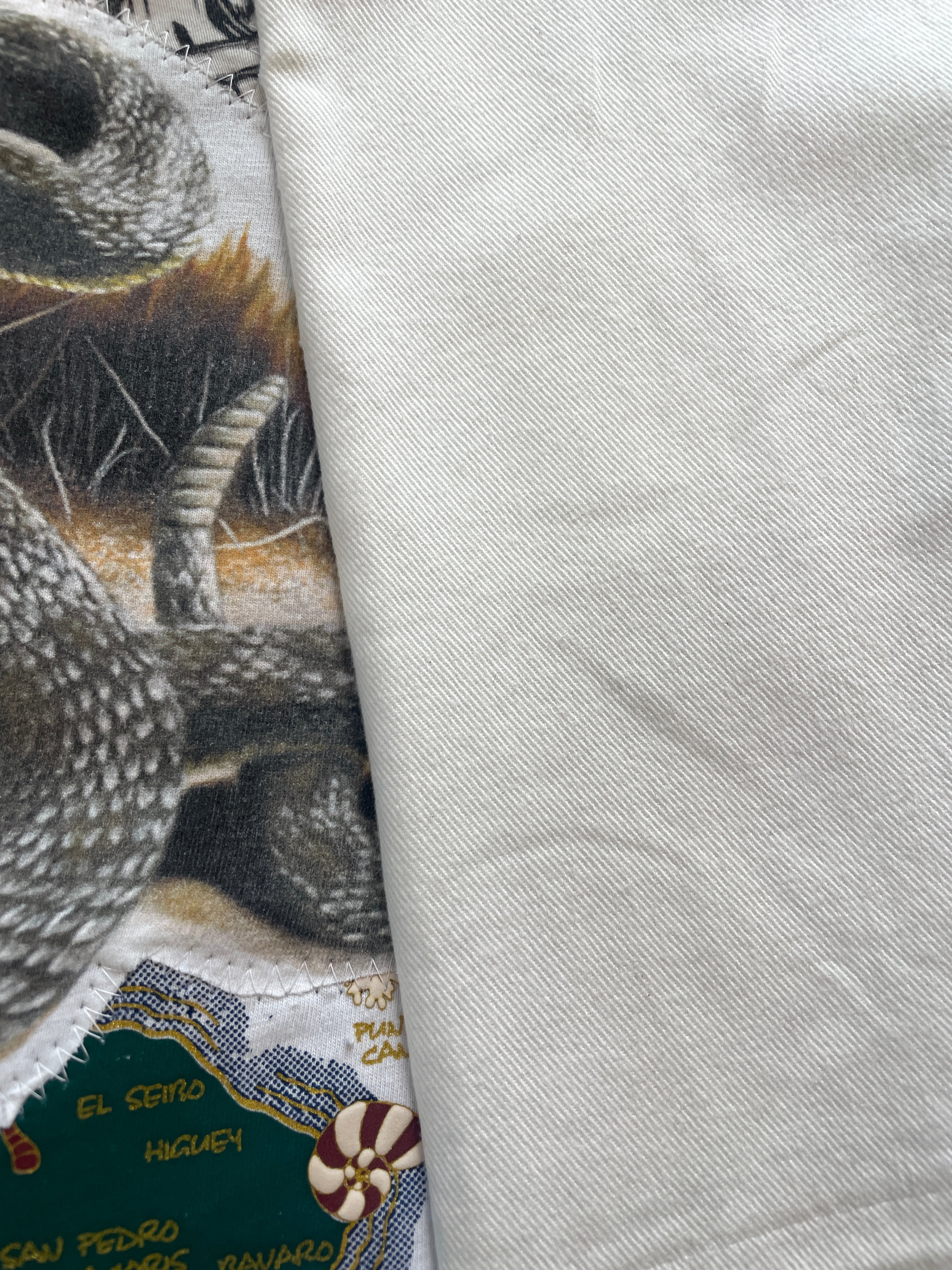 White Snakes flare jeans